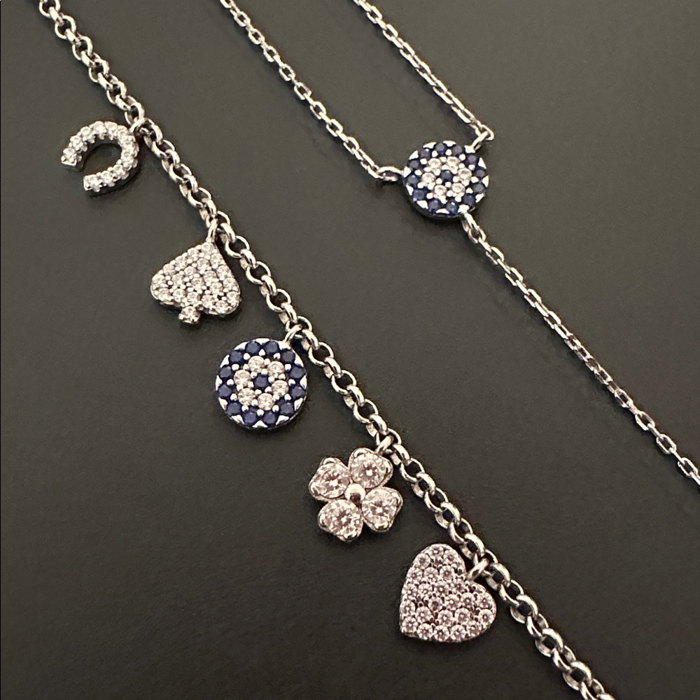 Stella Picciotto necklace and charm bracelet